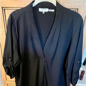 Calvin Klein top. New without tags. Never worn.